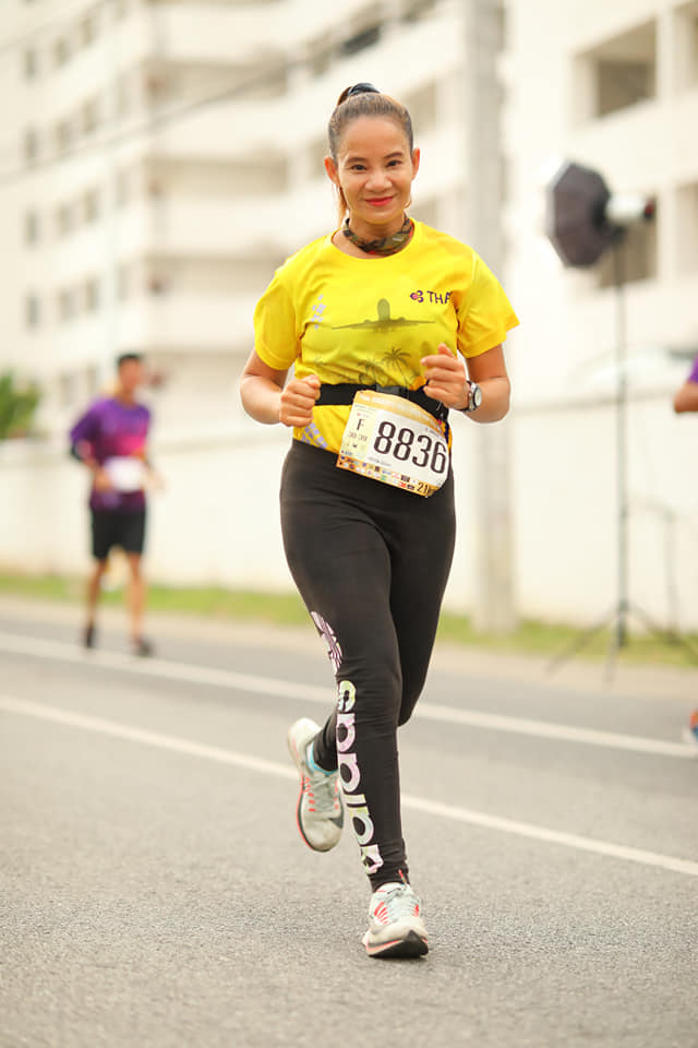 Woman Finishes Marathon Carrying Puppy She Rescued Along The Way